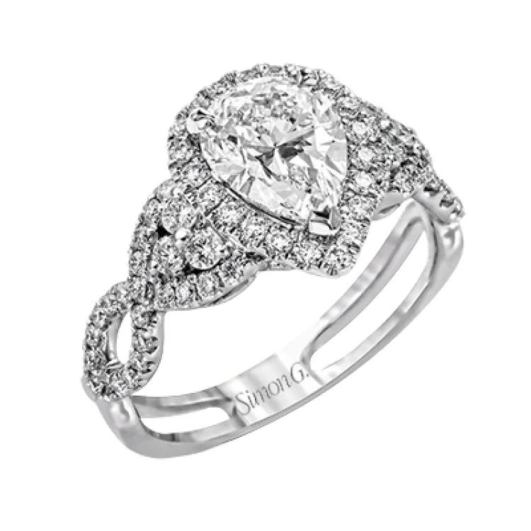 ladies rings for daily wear -Reflecting an intricate modern design, this remarkable white gold ring is emphasized by a lovely halo complemented with .59 ctw round cut white diamonds.