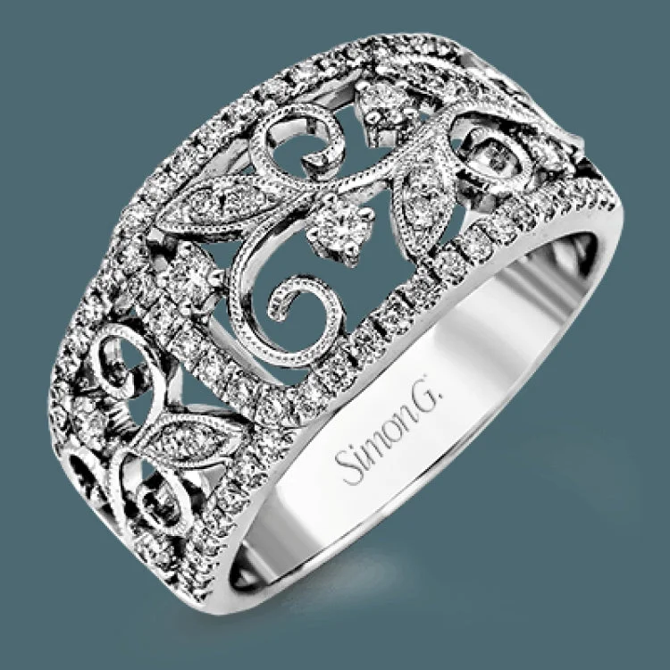 ladies rings personalized name ring -Lovely and intricate, this 18k white gold ring has a vintage-inspired design set with .52 ctw of round brilliant white diamonds.