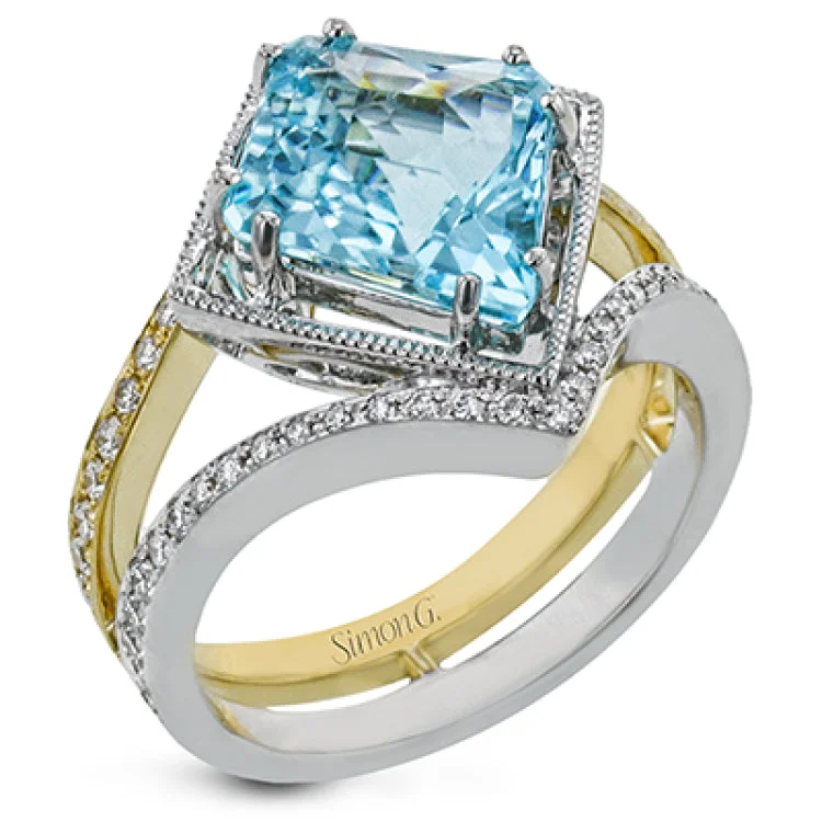 ladies rings for casual wear -This one of a kind color ring stuns in two-tone gold with a split shank diamond band 0.46 ctw, and a paraiba tourmaline center 3.20 ctw