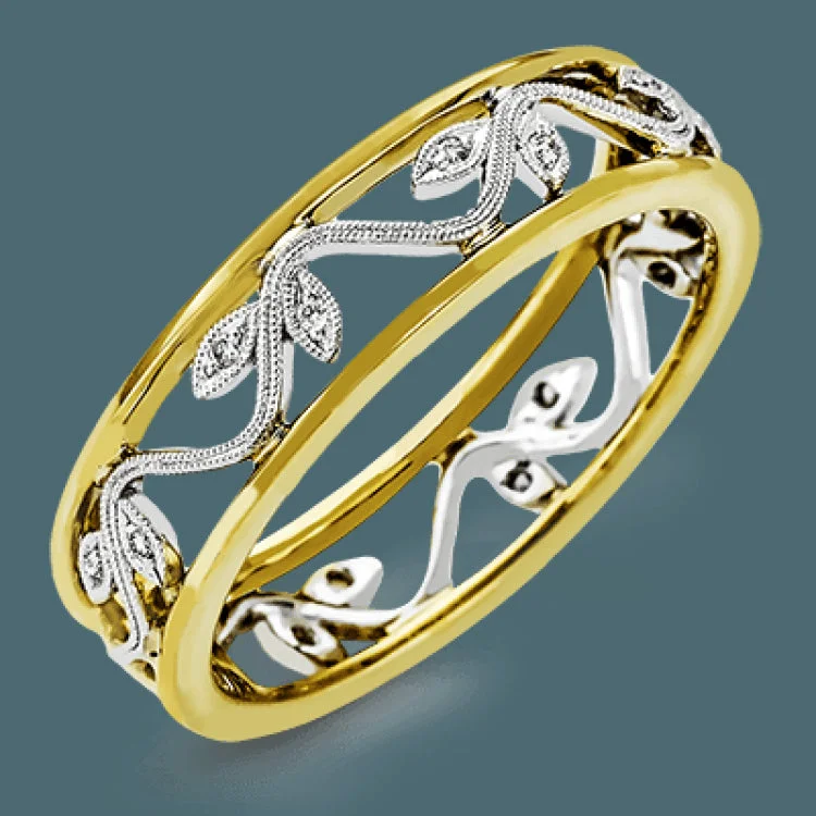 ladies rings dramatic bold style -An intricate floral design highlights this classic white and yellow gold ring accentuated by .04 ctw of elegant round cut white diamonds.