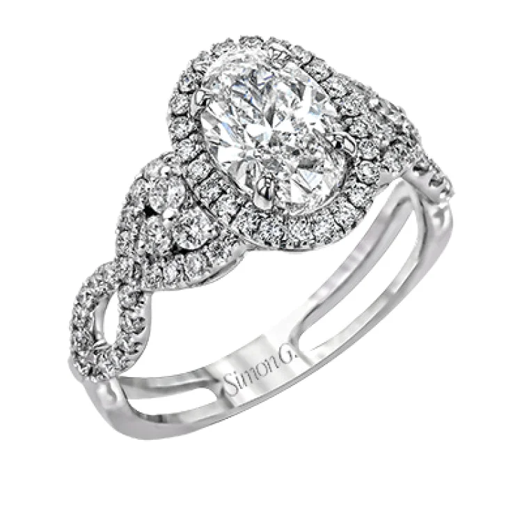 ladies rings platinum sleek shine -Reflecting an intricate modern design, this remarkable white gold ring is emphasized by a lovely halo complemented with .59 ctw round cut white diamonds.