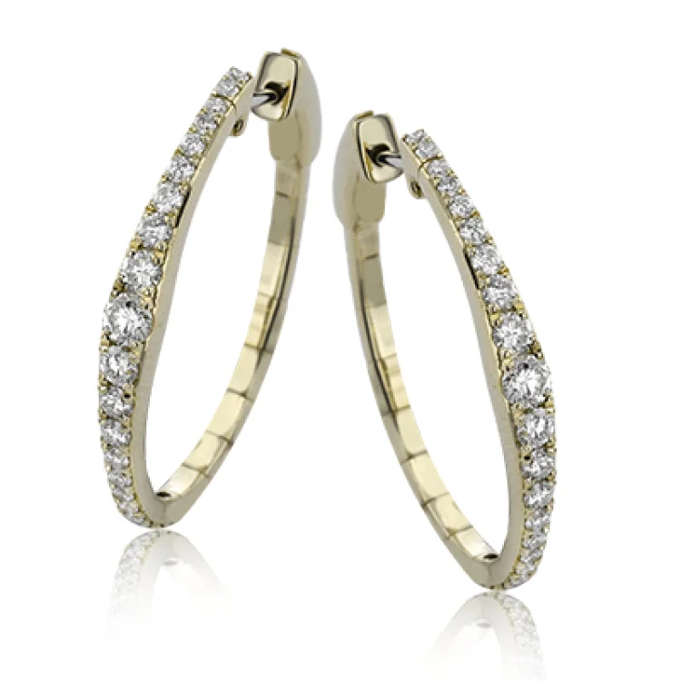 ladies rings dainty subtle charm -Dress up your classic button down with these 18K white gold hoops featuring .97cttw diamonds.