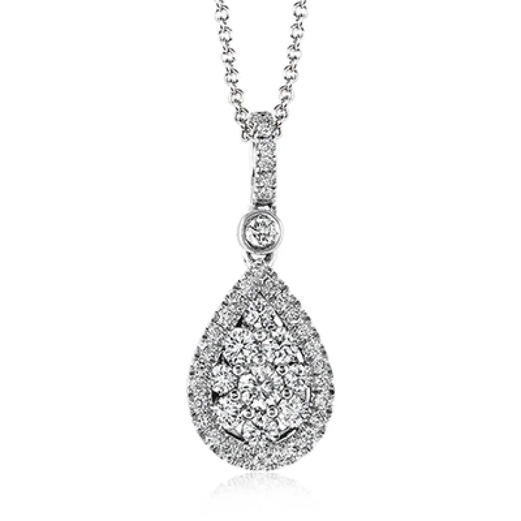 ladies rings trendy minimalist vibe -This glimmering teardrop shaped pendant is set with .47 ctw of round white diamonds and suspended from a diamond encrusted bail.