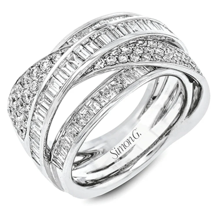 ladies rings trendy 2025 style -Bold and modern, this 18k white gold ring contains 1.11 ctw of baguette diamonds and .48 ctw of round diamonds set into a dynamic, overlapping design.