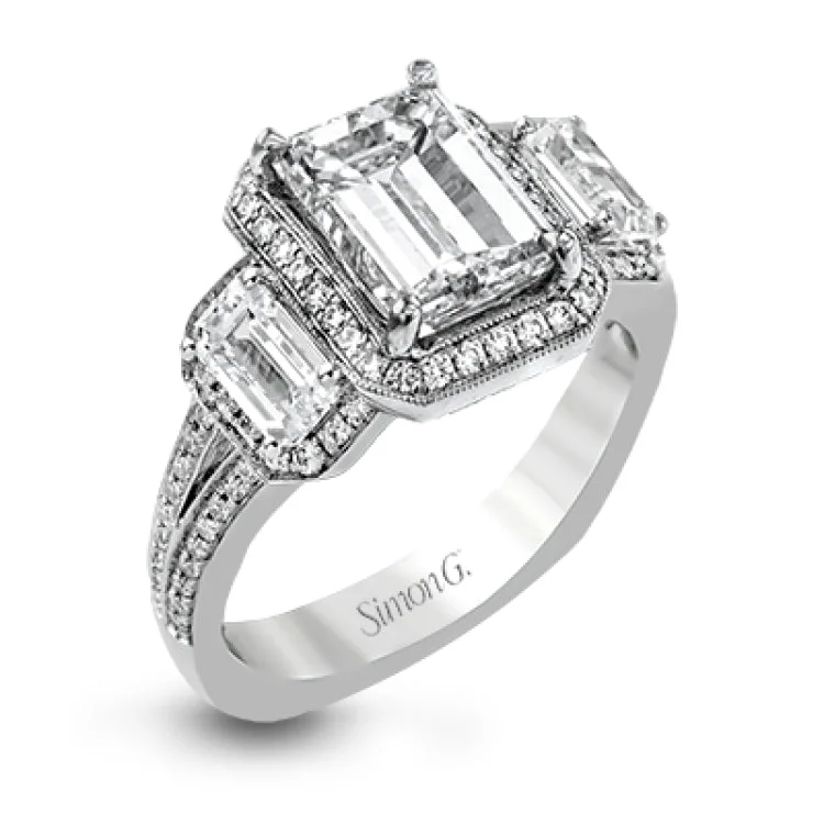 ladies rings with birthstone glow -This impressive white gold ring features .43 ctw emerald cut side diamonds and is accented with .38 ctw round cut diamonds.