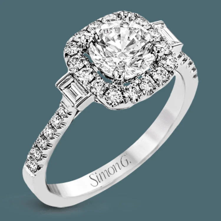 ladies rings for special occasions -This white gold ring glitters with accents of .41 ctw of round white diamonds and .14 ctw of baguette shaped diamonds for a timelessly elegant look.