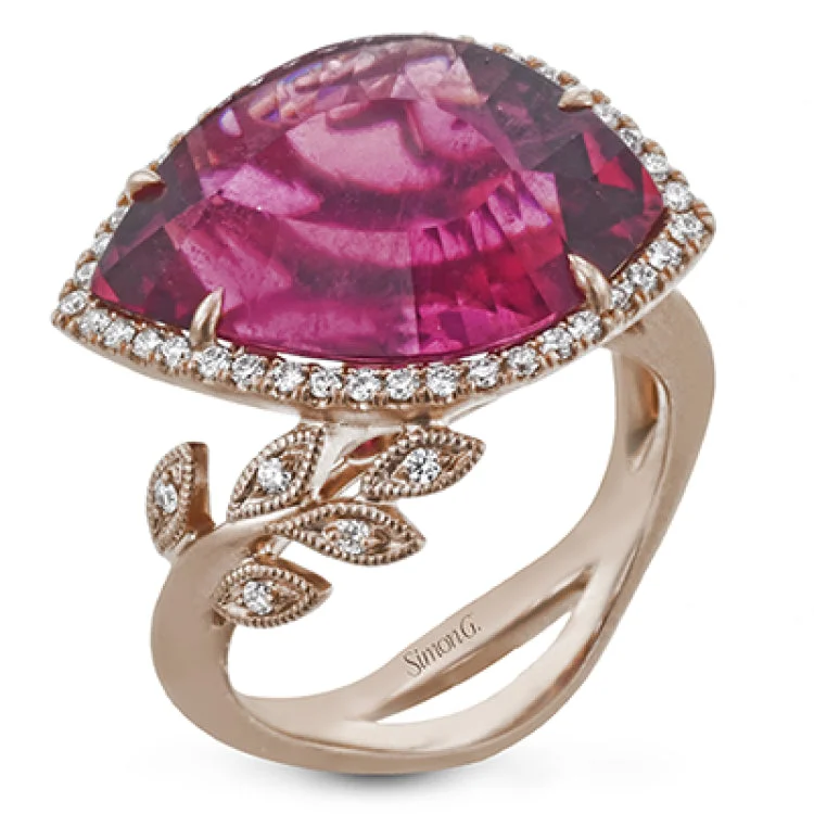 ladies rings heart shaped romance -A true masterpiece, this 18k rose gold ring features a 9.98ct rubelite surrounded by .29cttw diamonds.