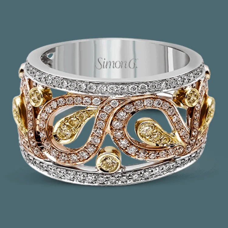 ladies rings with pearl accent -Featuring a gorgeous paisley-inspired design, this white, rose, and yellow gold classic band is set with .41 ctw round cut white diamonds and .23 ctw yellow diamonds.