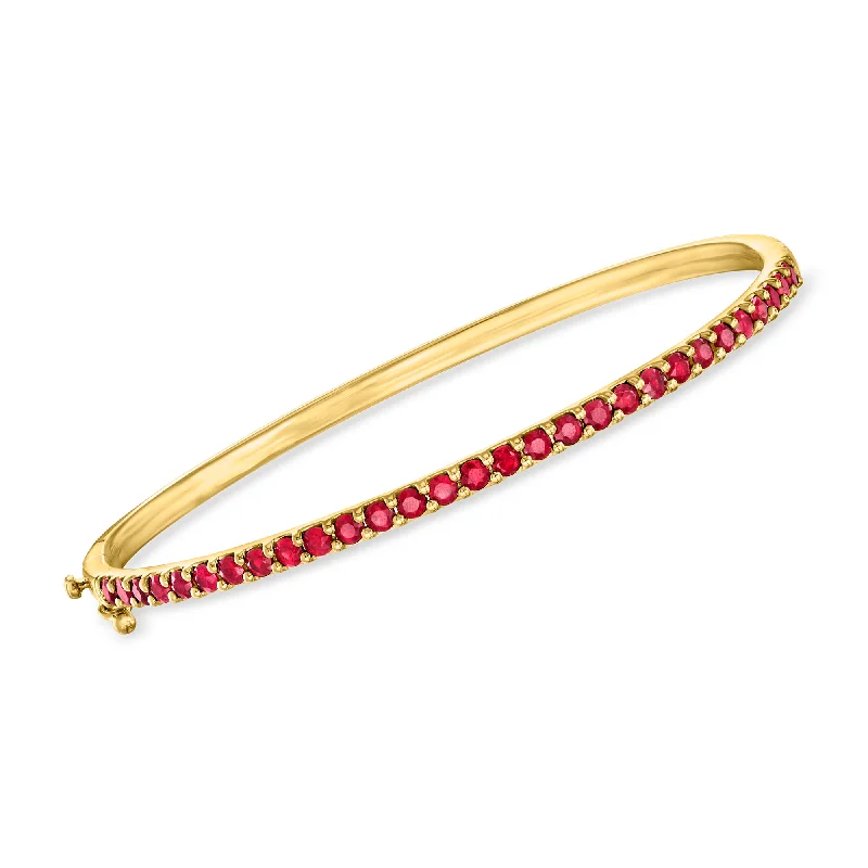 bracelets with green peridot -Ross-Simons Ruby Bangle Bracelet in 18kt Gold Over Sterling