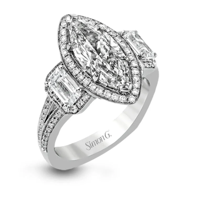 ladies rings simple delicate charm -This impressive white gold ring features .43 ctw emerald cut side diamonds and is accented with .38 ctw round cut diamonds.