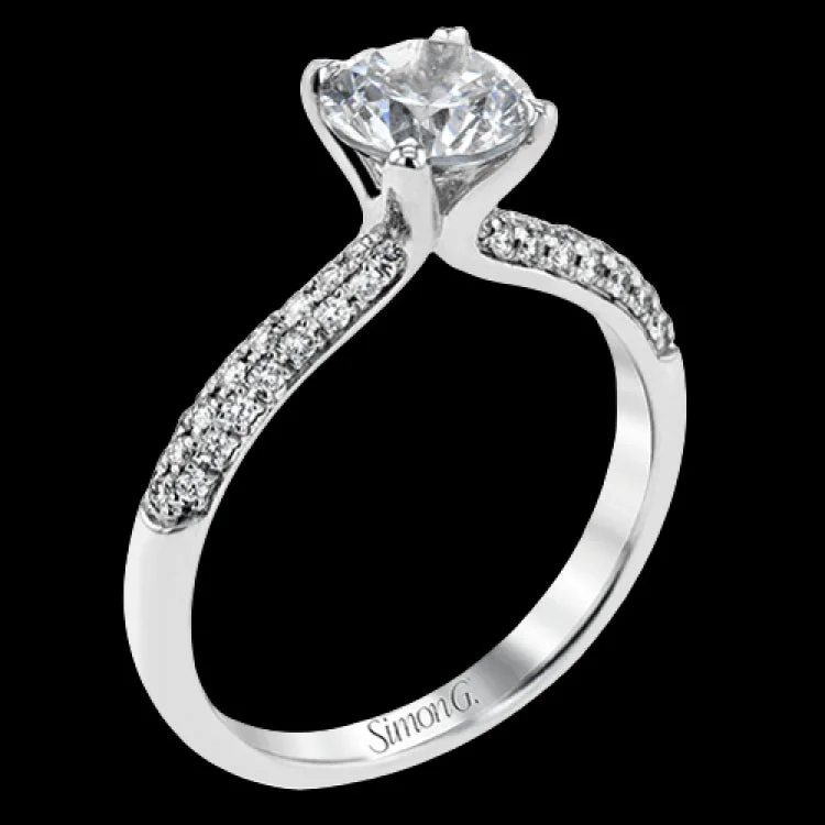 ladies rings with zircon shine -This sleek platinum ring features a simple, elegant design along with .23 ctw of round white diamond accents for extra sparkle.