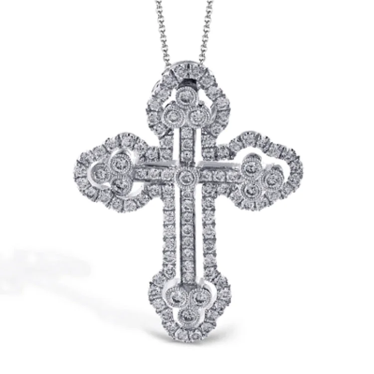 ladies rings dainty subtle charm -Featuring a classic motif, this intricate white gold cross pendant is set with .44 ctw round white diamonds.