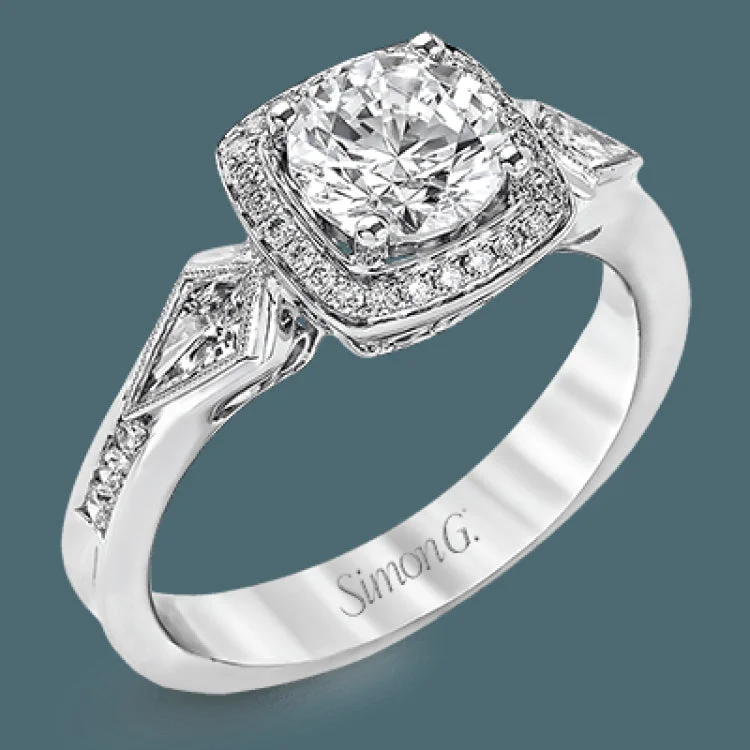 ladies rings with black diamond -The romantic setting of this vintage-inspired white gold ring highlights an eye-catching halo and .20 ctw of glistening round cut white diamonds and .23 ctw of kite shaped diamonds.