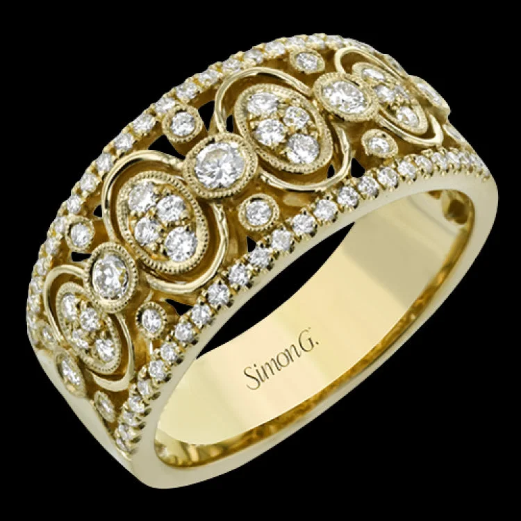 ladies rings eternity band style -Crafted from 18k yellow gold, this wide fashion ring contains with .52 ctw of white diamonds set within repeating round and oval shapes, creating a lovely effect.